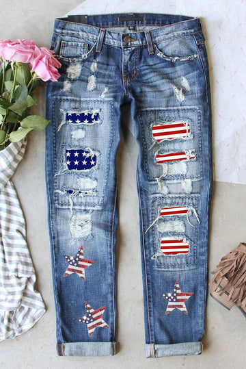 Distressed mid-rise waist straight jeans with US flag patches and star designs on blue denim