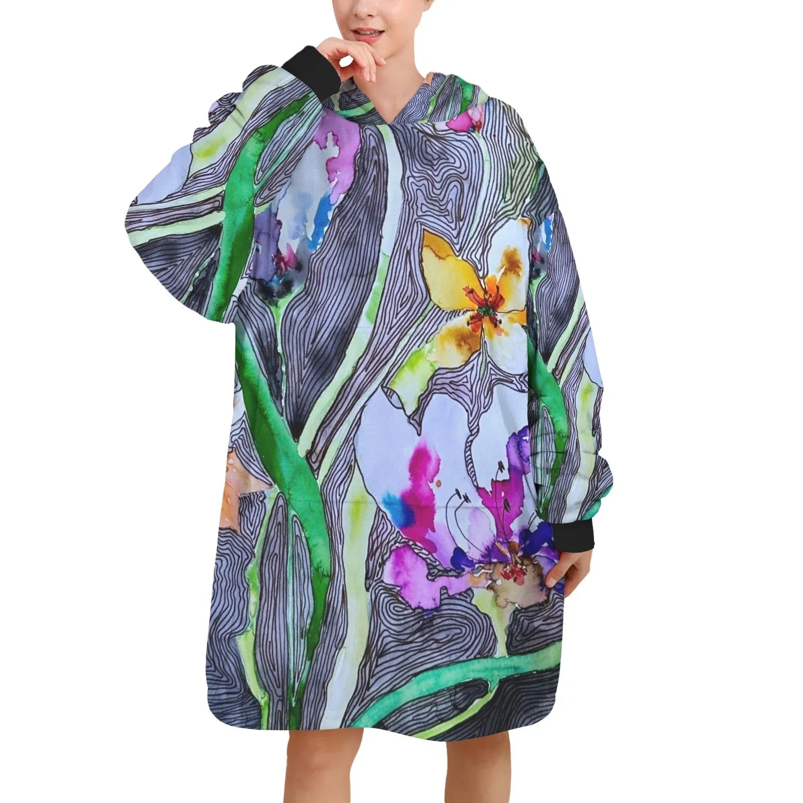 Woman wearing colorful lined tulips blanket hoodie made of soft polyester fleece