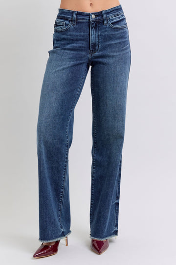 Judy Blue raw hem mid-rise blue jeans with frayed edges and straight leg fit.