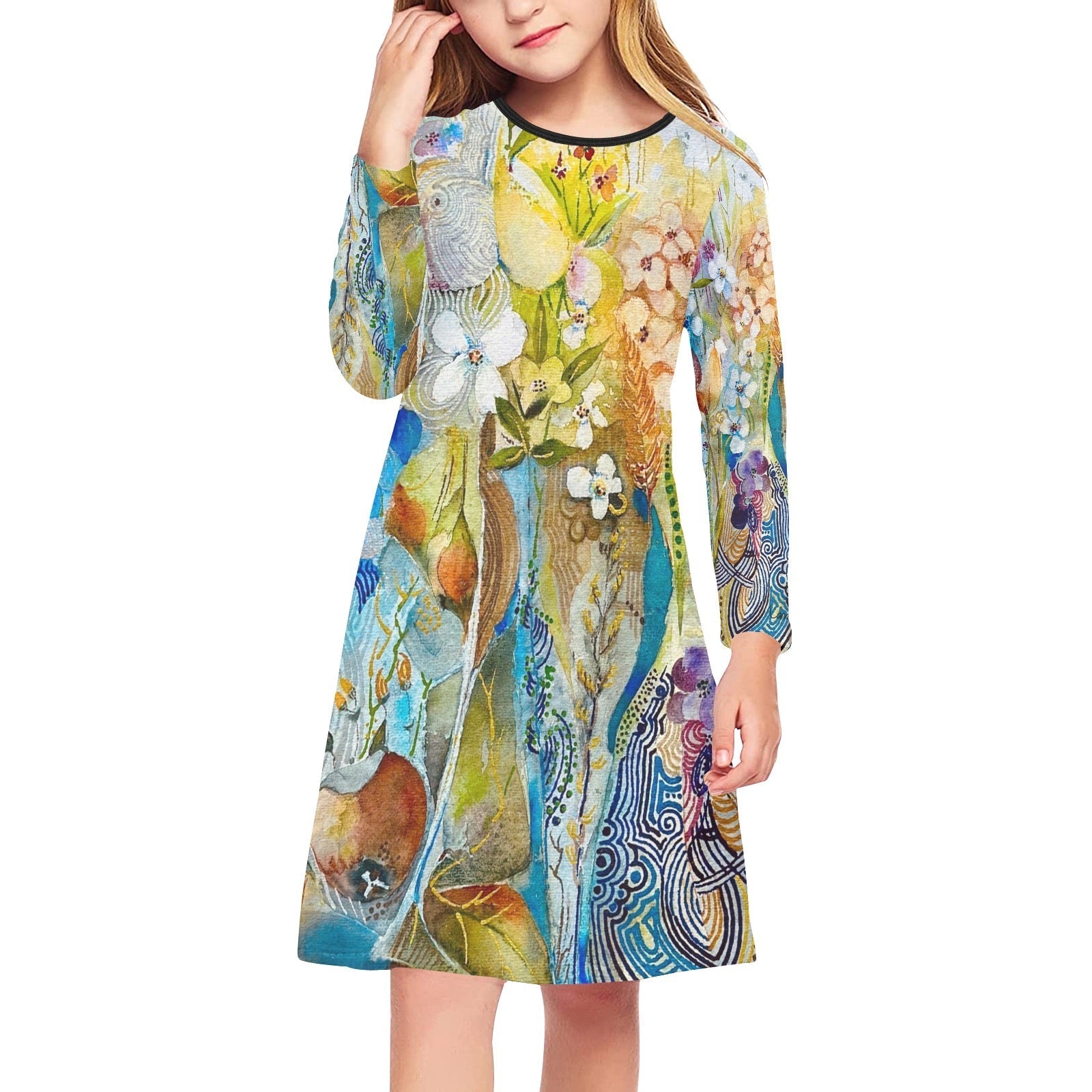 Girl wearing a long sleeve midi Love My Blooms Dress with colorful floral and abstract patterns.