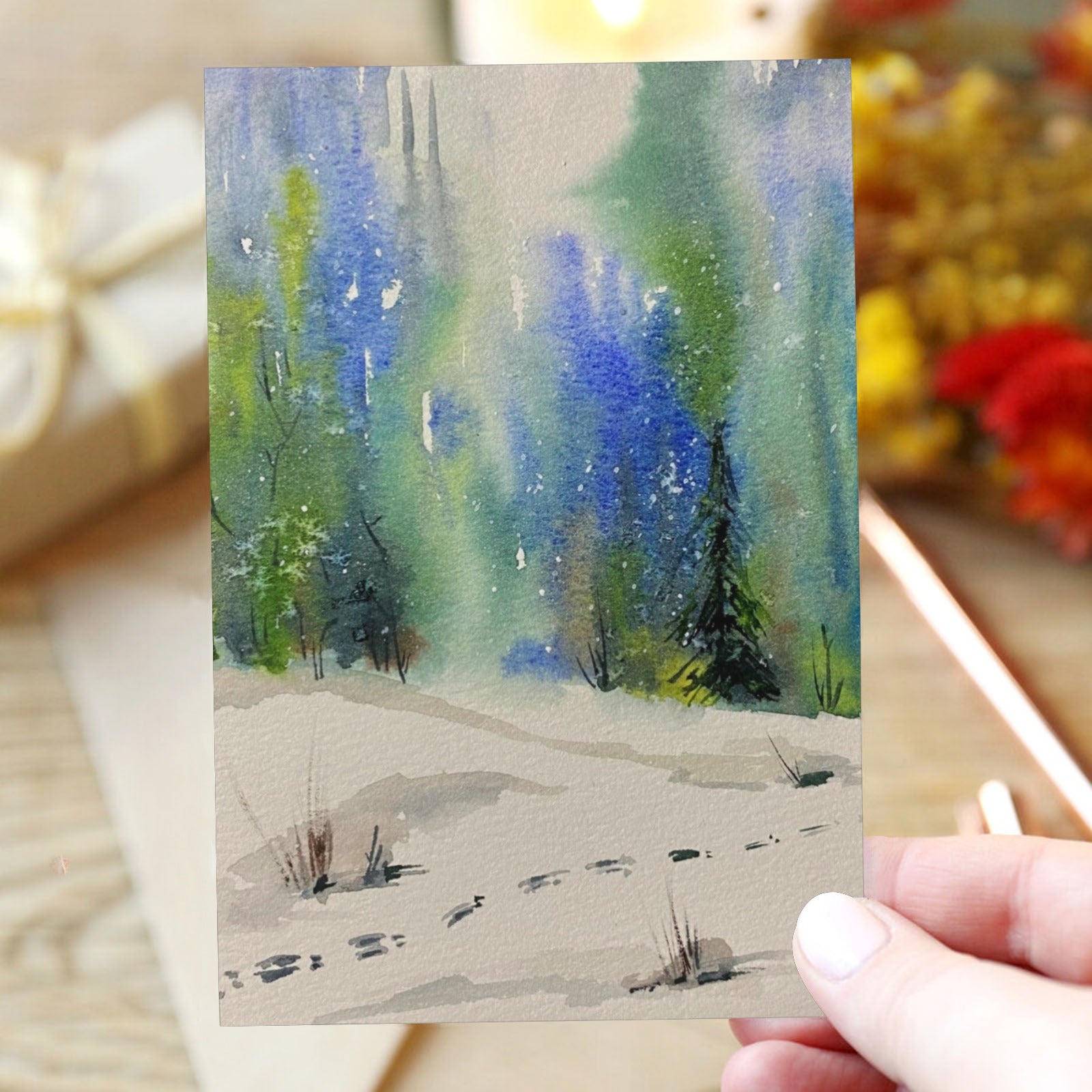 Bunny Traces Christmas Greeting Card 4x6 by LanaArtSweden with watercolor design and heart-shaped clasp envelope.