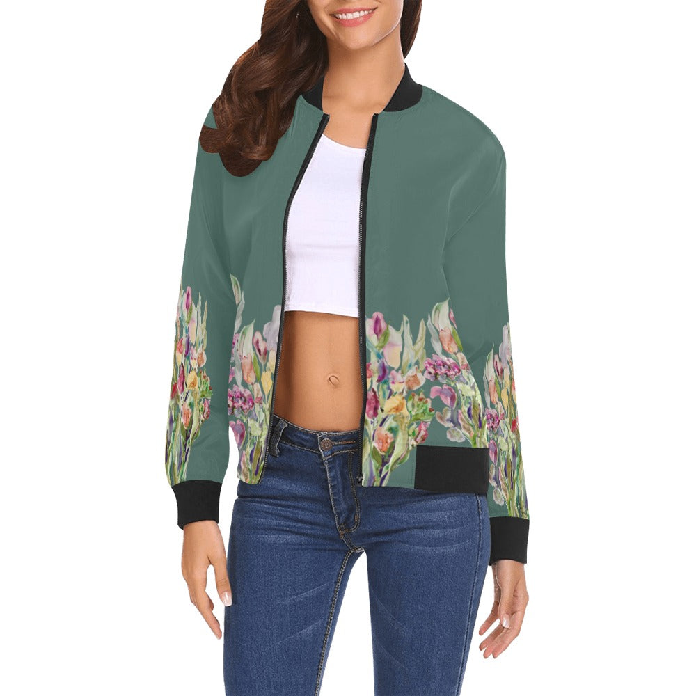 Rusty Life Bomber Jacket for women with green base and floral artwork, ribbed collar and cuffs, zip-up front, styled with jeans and white crop top