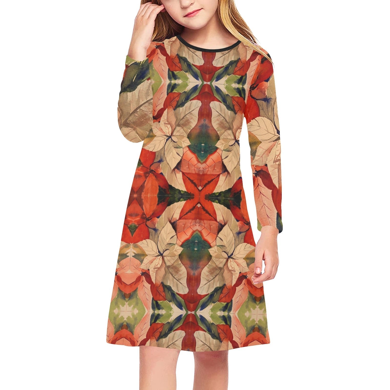 Girl wearing a long sleeve Perfect Amaryllis Dress with a colorful fall leaf pattern, midi length, and round neckline.