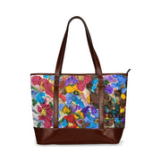 Fall Flowers Tote handbag with colorful floral design, waterproof fabric, and brown faux leather straps.