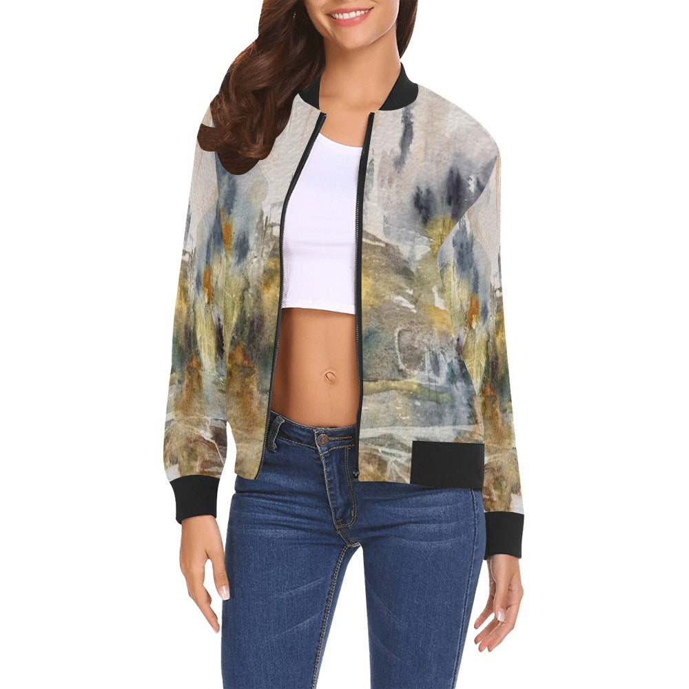 Woman wearing abstract warm hues all over print bomber jacket with ribbed black cuffs and collar