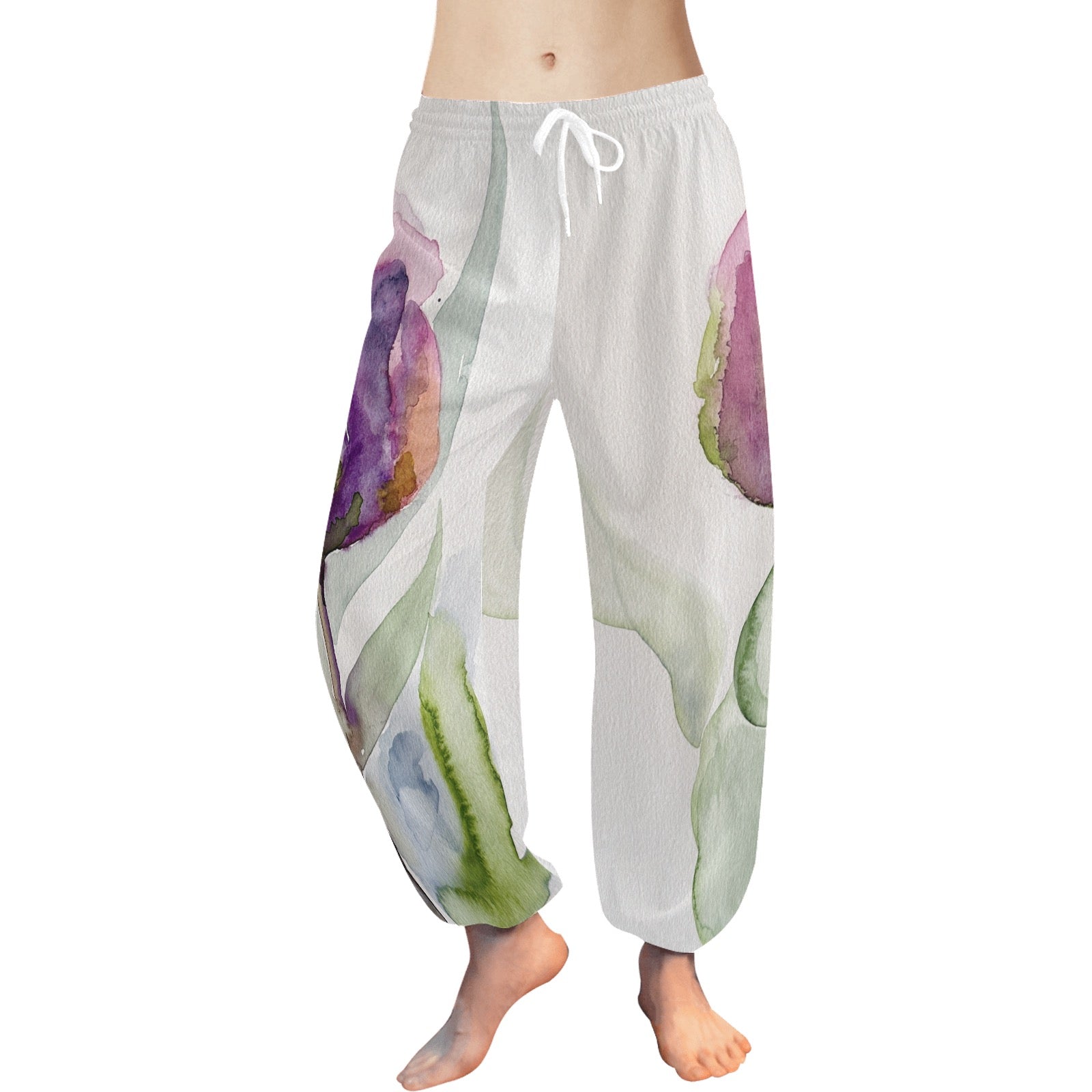 Lightweight Tulip Pants with watercolor floral print, drawstring waist, and ankle cuffs, made from soft chiffon fabric.