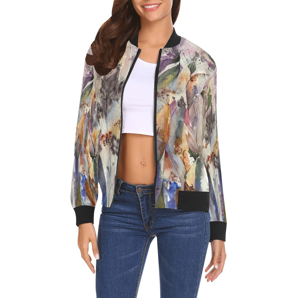 Women's bomber jacket with mystery plants all over print, black ribbed collar, cuffs, and hem, styled with jeans and white crop top.