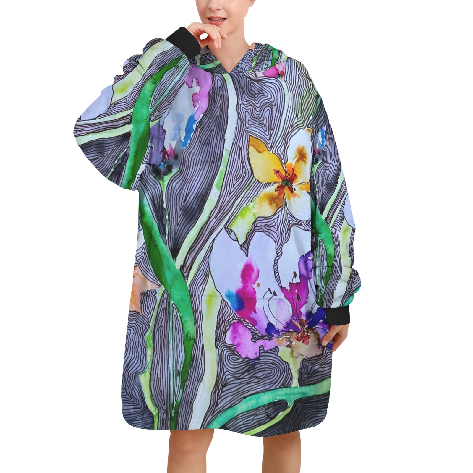 Woman wearing colorful lined tulips blanket hoodie made of soft polyester fleece