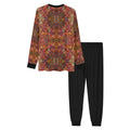 Men's Dark Swirls pajama set with long sleeve top and relaxed fit trousers, featuring ribbed cotton collar and cuffs.