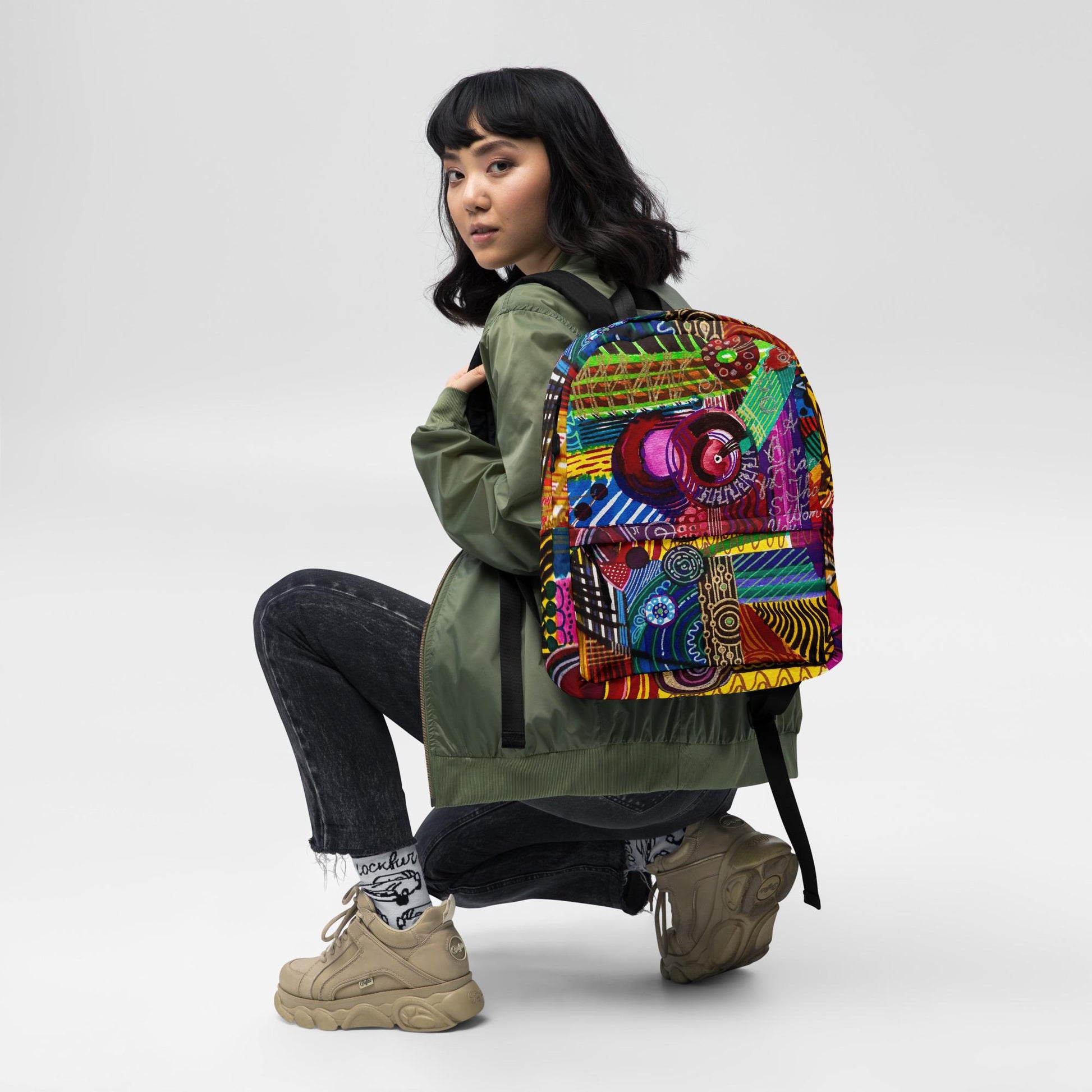 Medium-size backpack with original artwork by LanaArtSweden, featuring a durable polyester build, water-resistant material, laptop compartment, and ergonomic straps.