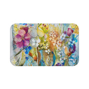 Colorful and elegant floral bath mat in vibrant blue, pink, and yellow hues with soft microfiber and anti-slip backing