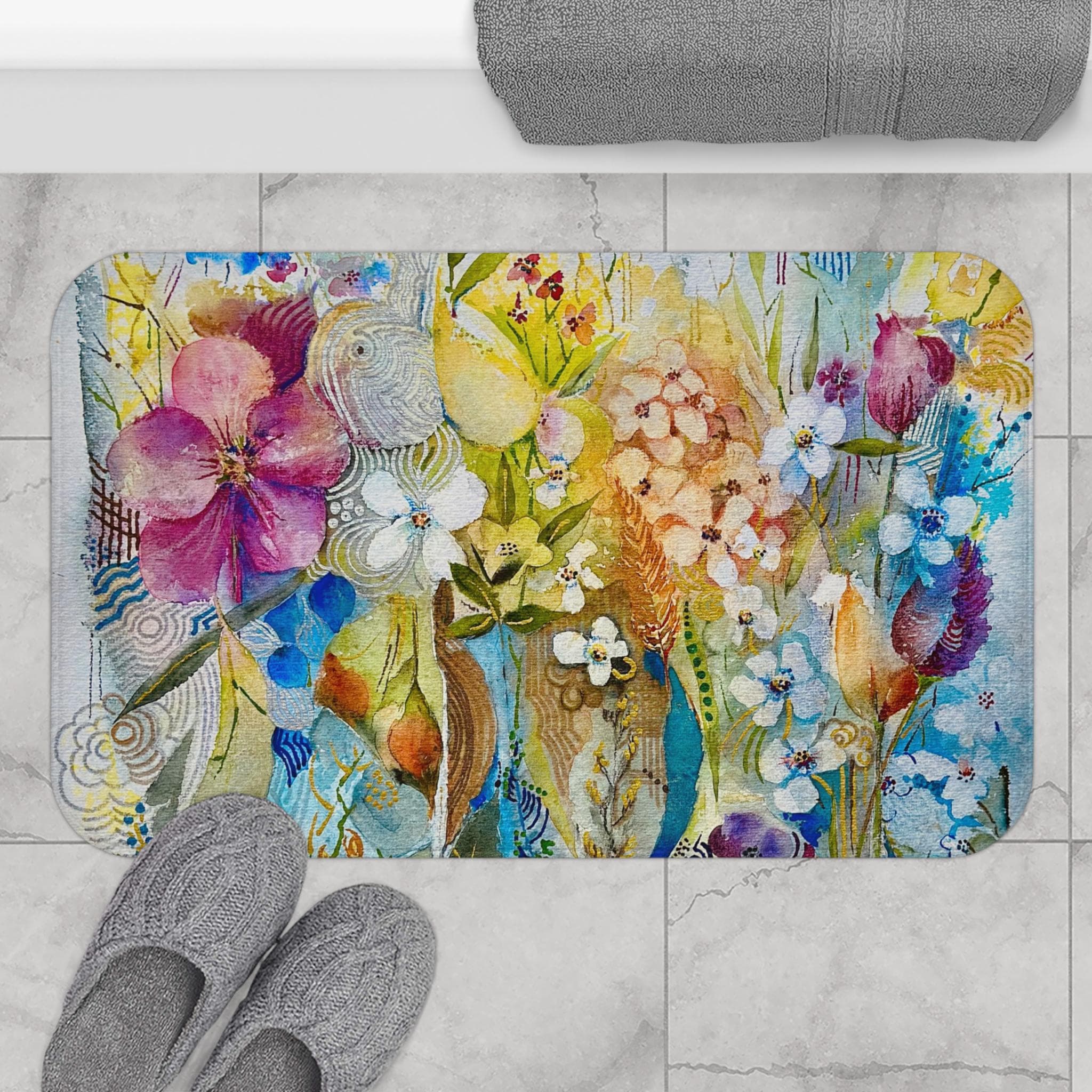 Colorful and elegant bath mat with floral watercolor design, microfiber material, anti-slip backing, available in two sizes.